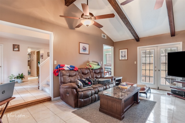 tiled living room with vaulted ceiling with beams, french doors, and ceiling fan