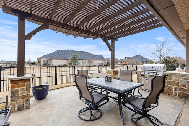 view of patio / terrace featuring a pergola and grilling area