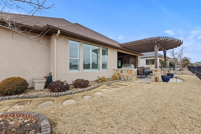 exterior space featuring a pergola and a patio area