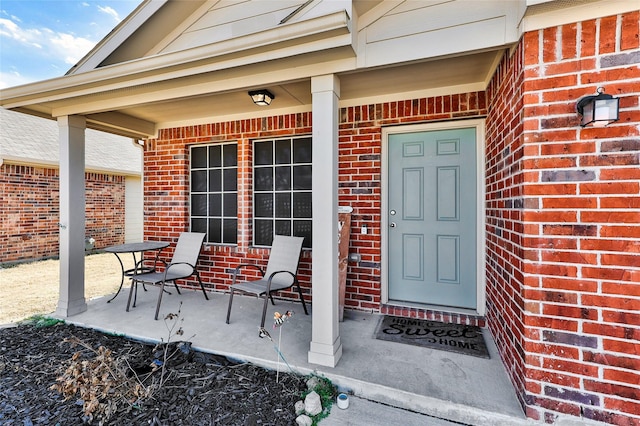 doorway to property with a porch