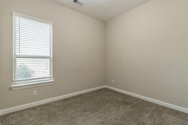 view of carpeted spare room