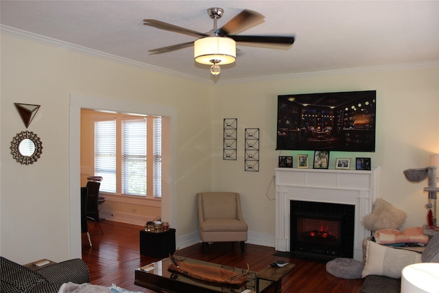 living room with crown molding and dark hardwood / wood-style floors