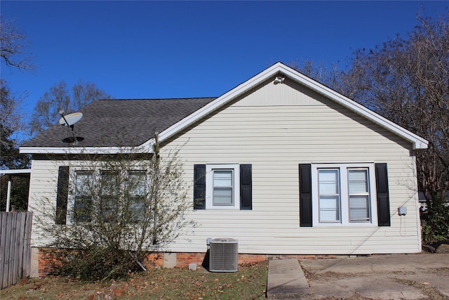 view of home's exterior with central AC