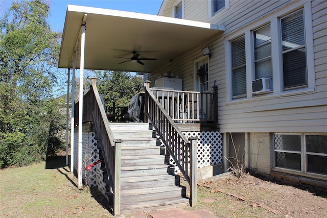 view of side of home featuring cooling unit and ceiling fan