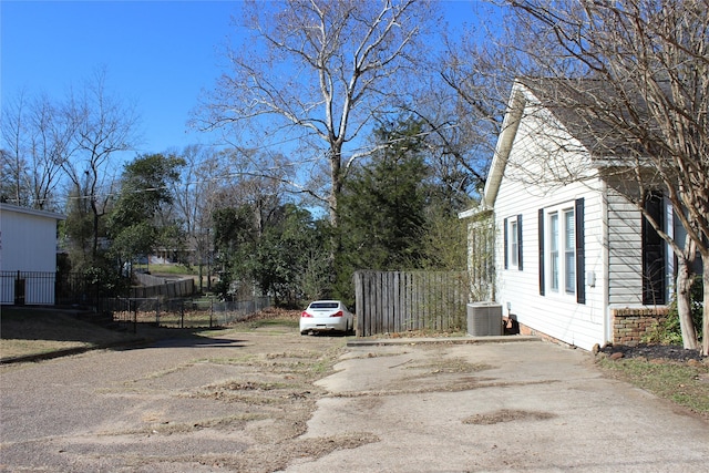 view of property exterior featuring central AC