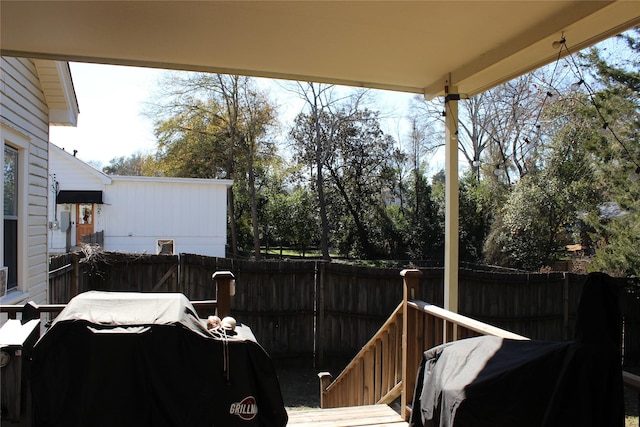 wooden terrace with grilling area