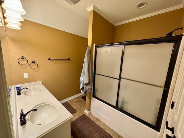 bathroom with vanity, combined bath / shower with glass door, and ornamental molding