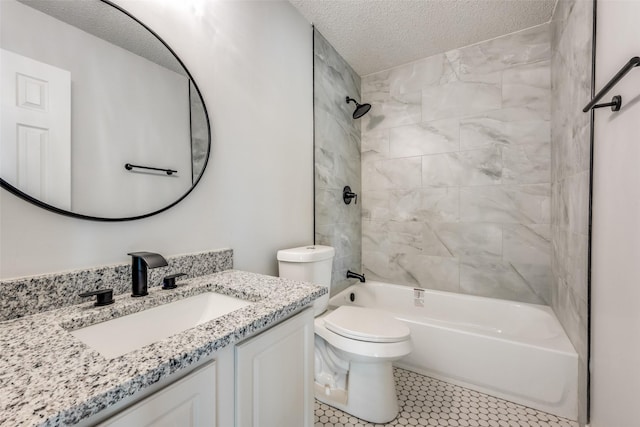 full bathroom featuring tile patterned flooring, tiled shower / bath combo, vanity, a textured ceiling, and toilet