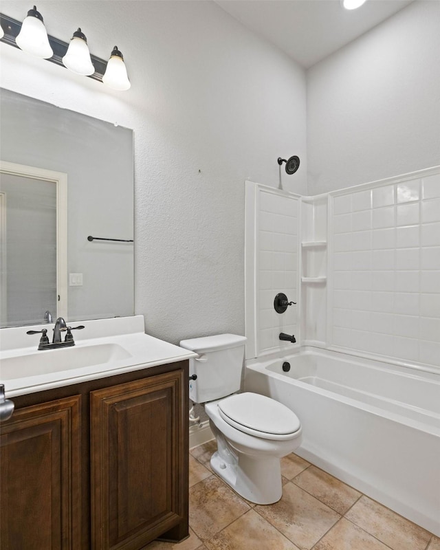 bathroom with toilet, tile patterned floors, tub / shower combination, and vanity
