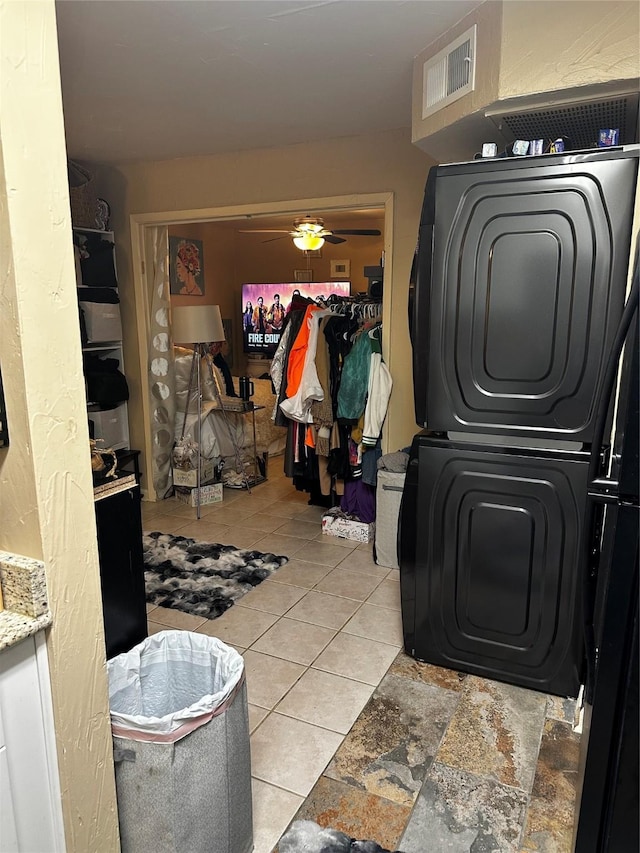 laundry room with ceiling fan