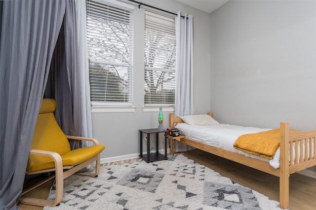 bedroom featuring hardwood / wood-style floors