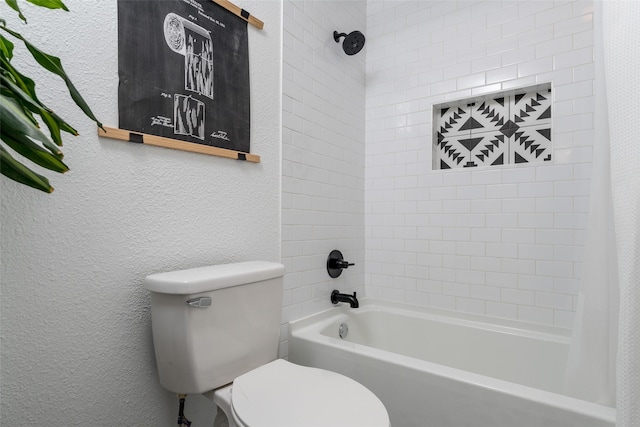 bathroom featuring toilet and shower / bath combo