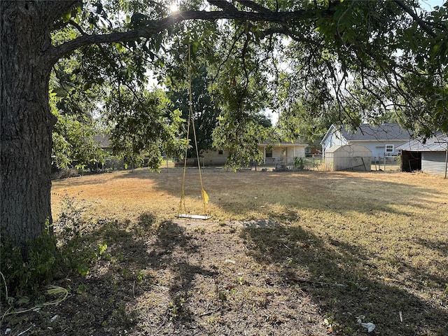 view of yard with fence