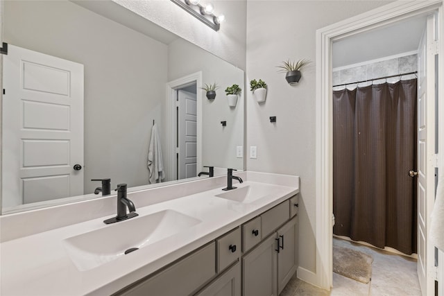 bathroom featuring vanity and a shower with shower curtain