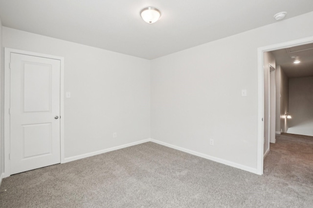 empty room with light colored carpet