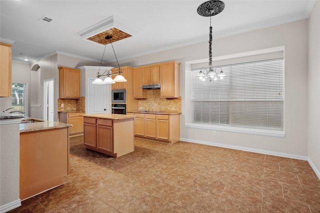 kitchen featuring light brown cabinetry, decorative light fixtures, a center island, black appliances, and backsplash