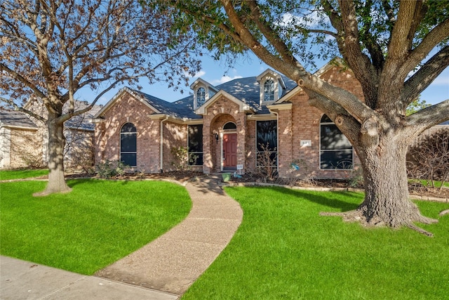 view of front of house with a front lawn