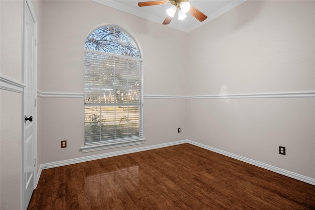 empty room featuring hardwood / wood-style flooring, ceiling fan, and ornamental molding