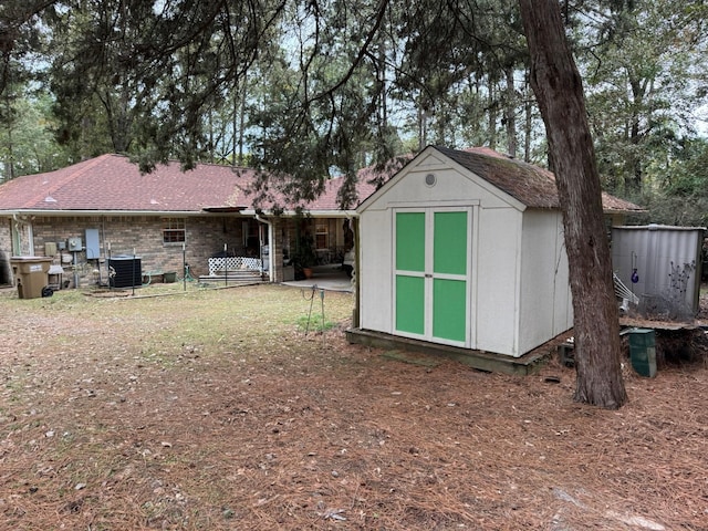 view of outbuilding with cooling unit