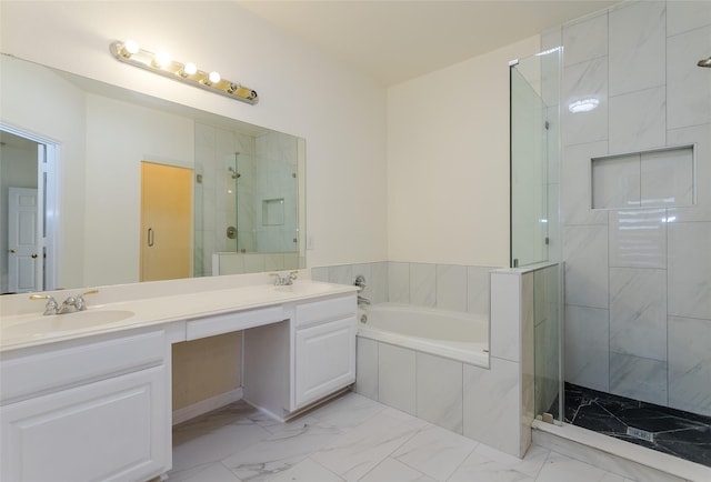 bathroom featuring vanity and shower with separate bathtub