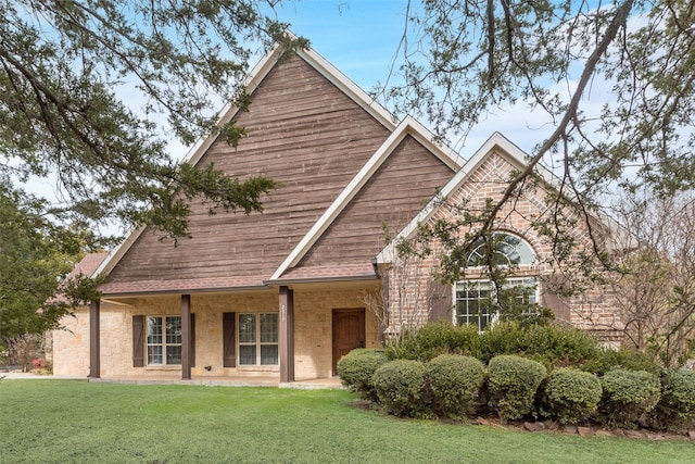 view of front of home with a front yard