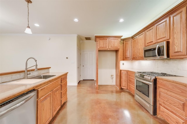 kitchen with sink, stainless steel appliances, tasteful backsplash, ornamental molding, and decorative light fixtures