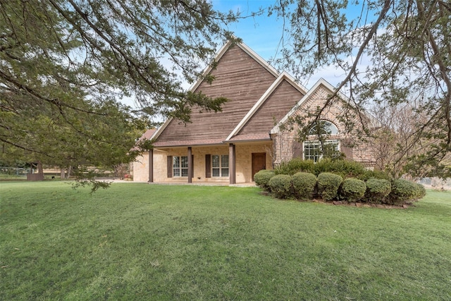 view of front of home with a front yard