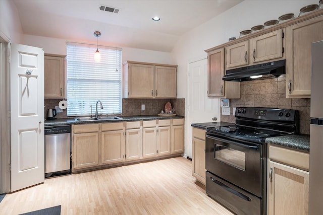 kitchen featuring sink, hanging light fixtures, light wood-type flooring, stainless steel dishwasher, and black range with electric cooktop