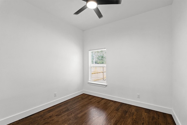 spare room with ceiling fan and wood-type flooring