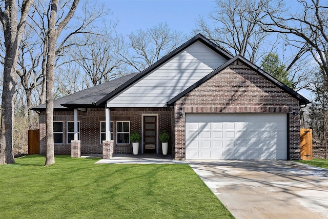 view of front facade featuring a garage, covered porch, and a front lawn