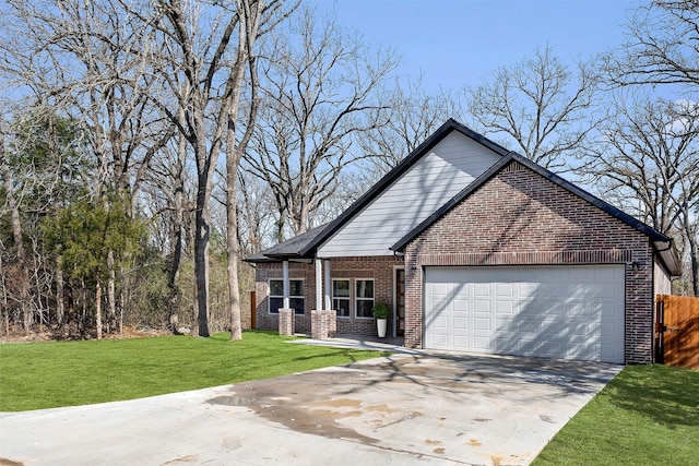 view of front facade with a garage and a front yard