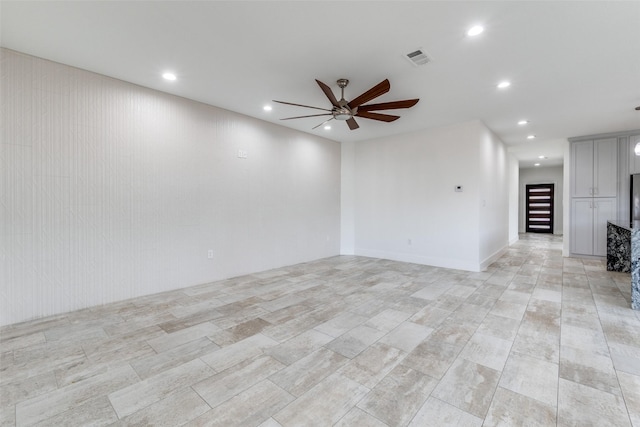 unfurnished living room with recessed lighting, visible vents, and a ceiling fan