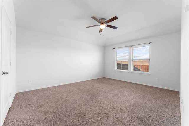 unfurnished room with ceiling fan and carpet flooring