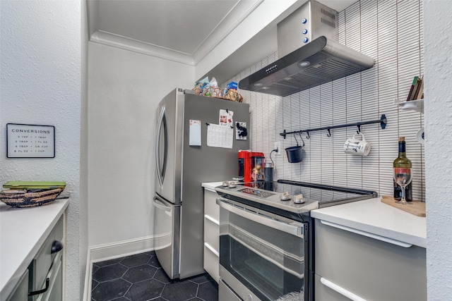 kitchen with crown molding, stainless steel appliances, extractor fan, and dark tile patterned floors