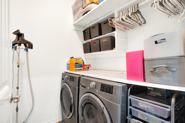 laundry room featuring independent washer and dryer