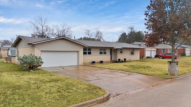 ranch-style home featuring a garage and a front lawn