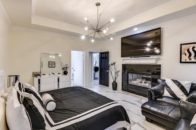 bedroom with an inviting chandelier, ornamental molding, a fireplace, and a raised ceiling