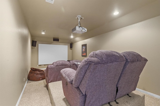 home theater featuring light carpet