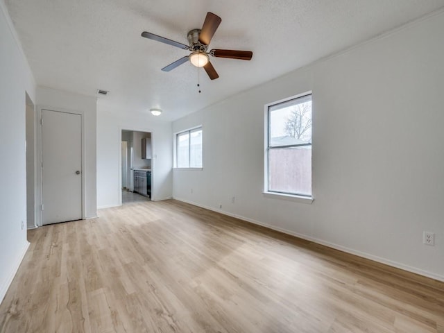 interior space featuring ceiling fan and light wood-type flooring