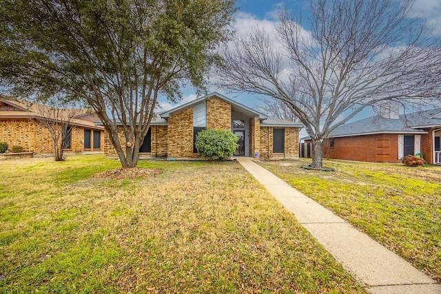 single story home featuring a front yard