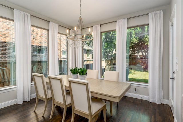 sunroom with a chandelier