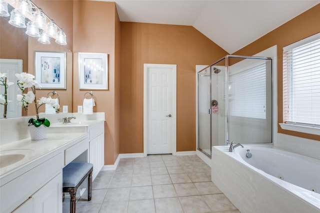 bathroom featuring vaulted ceiling, vanity, independent shower and bath, and tile patterned flooring