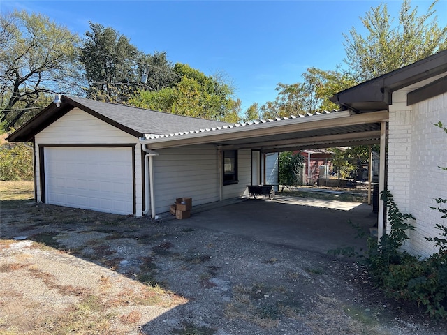 garage with a carport