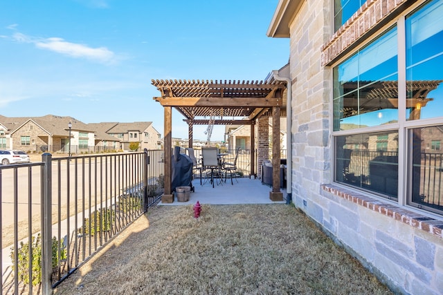 view of yard with a pergola and a patio area