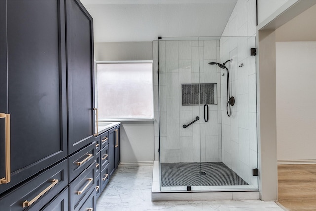 bathroom with vanity and walk in shower