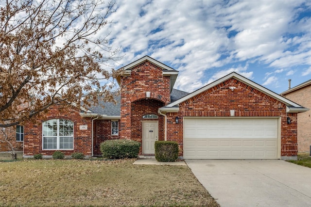 front facade featuring a garage and a front yard