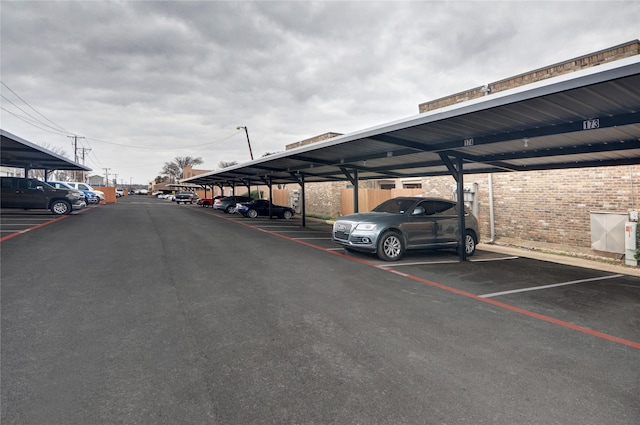 view of car parking featuring a carport