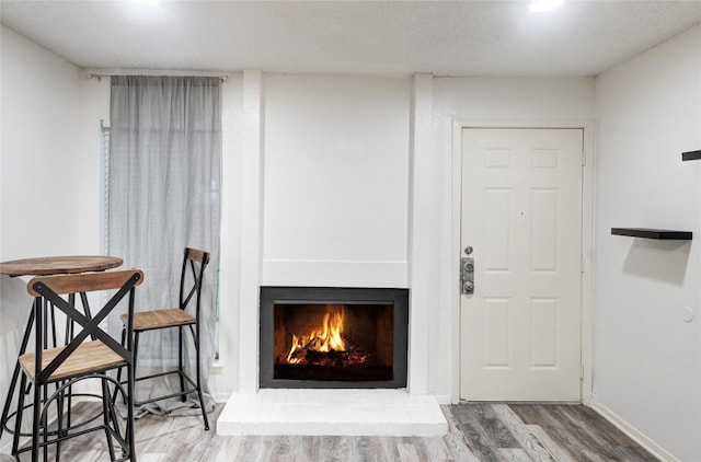 interior space with hardwood / wood-style floors