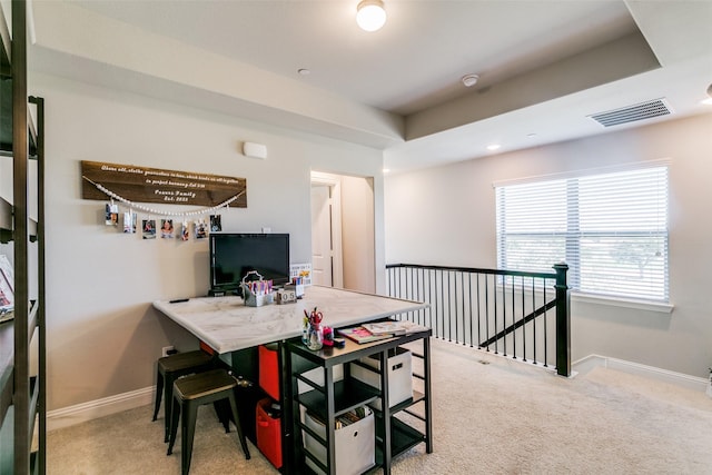 dining area featuring carpet