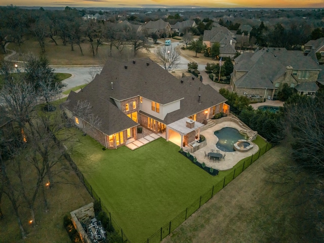 view of aerial view at dusk